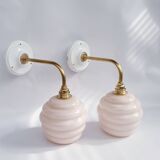 Swan neck and glass globe wall lights