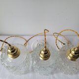 Trio of molded glass pendant lights
