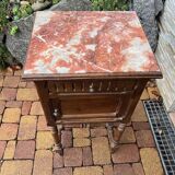 Wooden bedside table with marble top