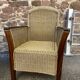 pair of Colonial-style wood and rattan seats