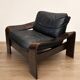 Paire de fauteuils scandinaves en cuir et palissandre