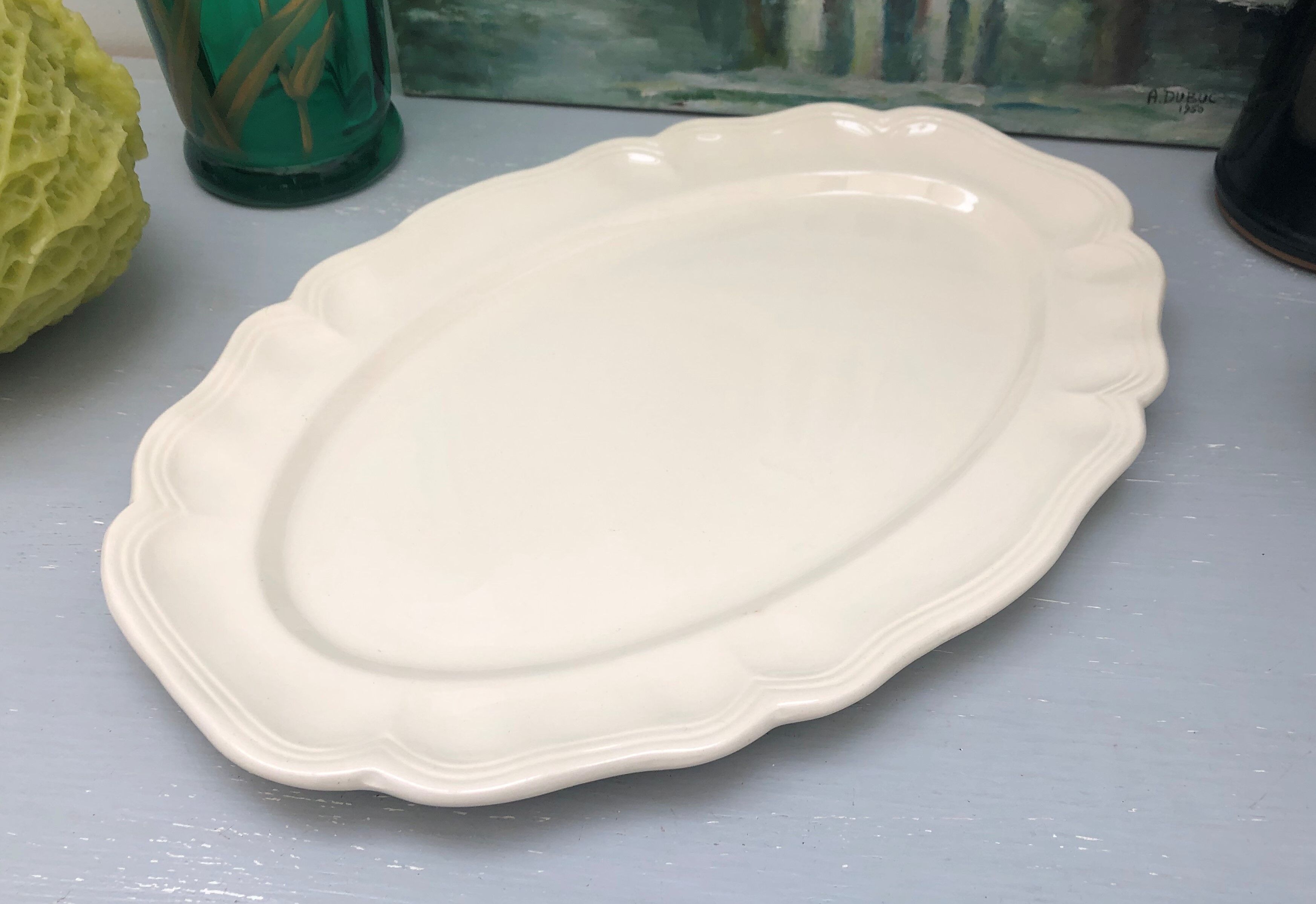 Oval ivory dish with gadroons, signed Sarreguemines France.