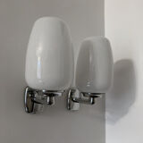 Chrome and opaline wall lights from the 70s.