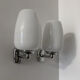 Chrome and opaline wall lights from the 70s.