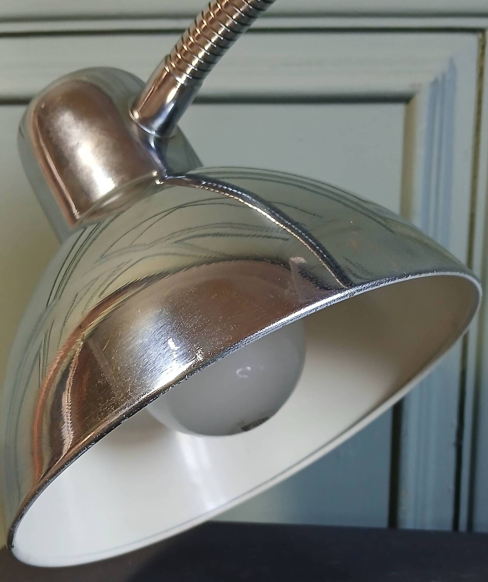 Articulated desk lamp in chrome metal, circa 1960.