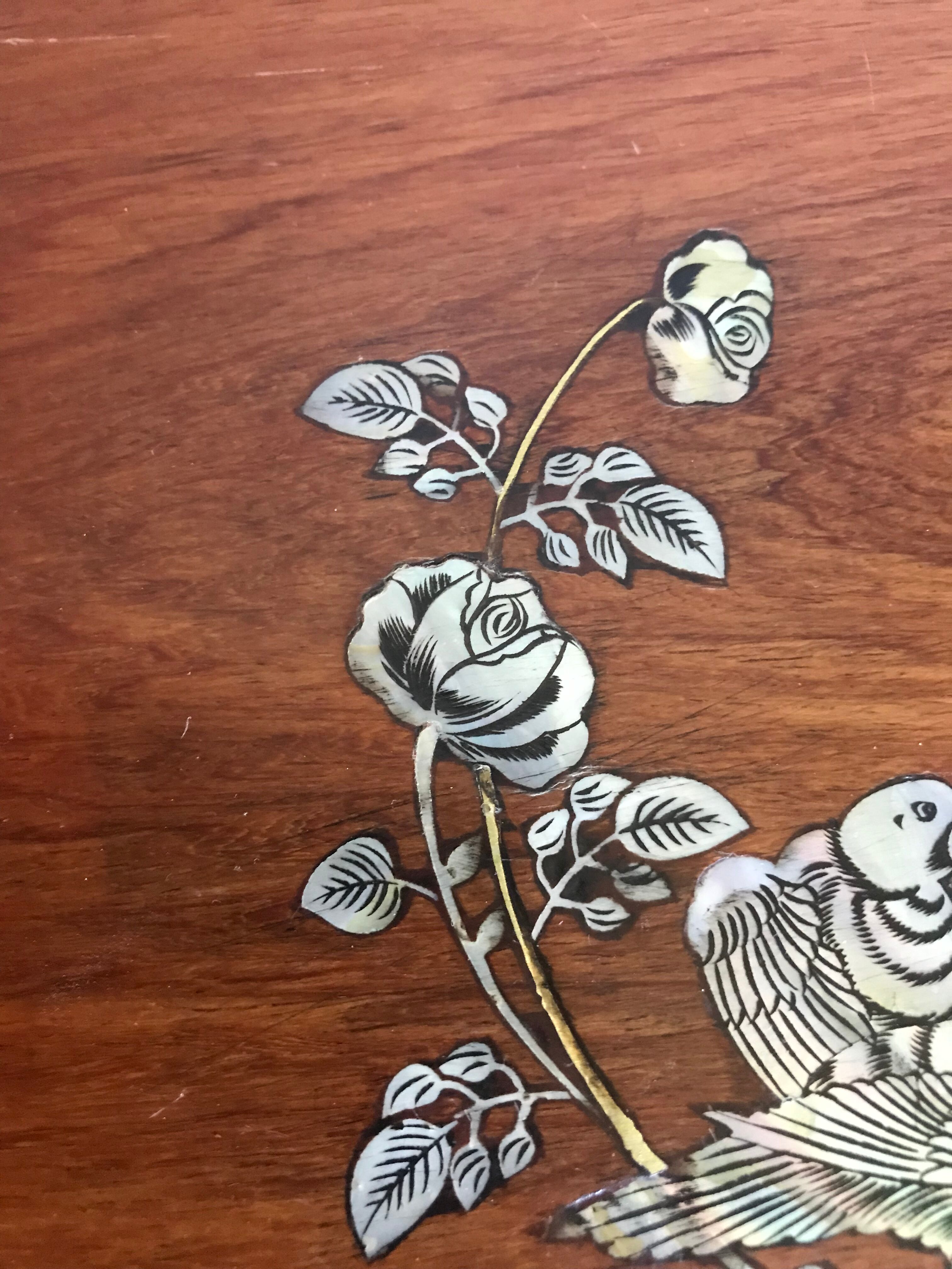 Wood and mother-of-pearl top