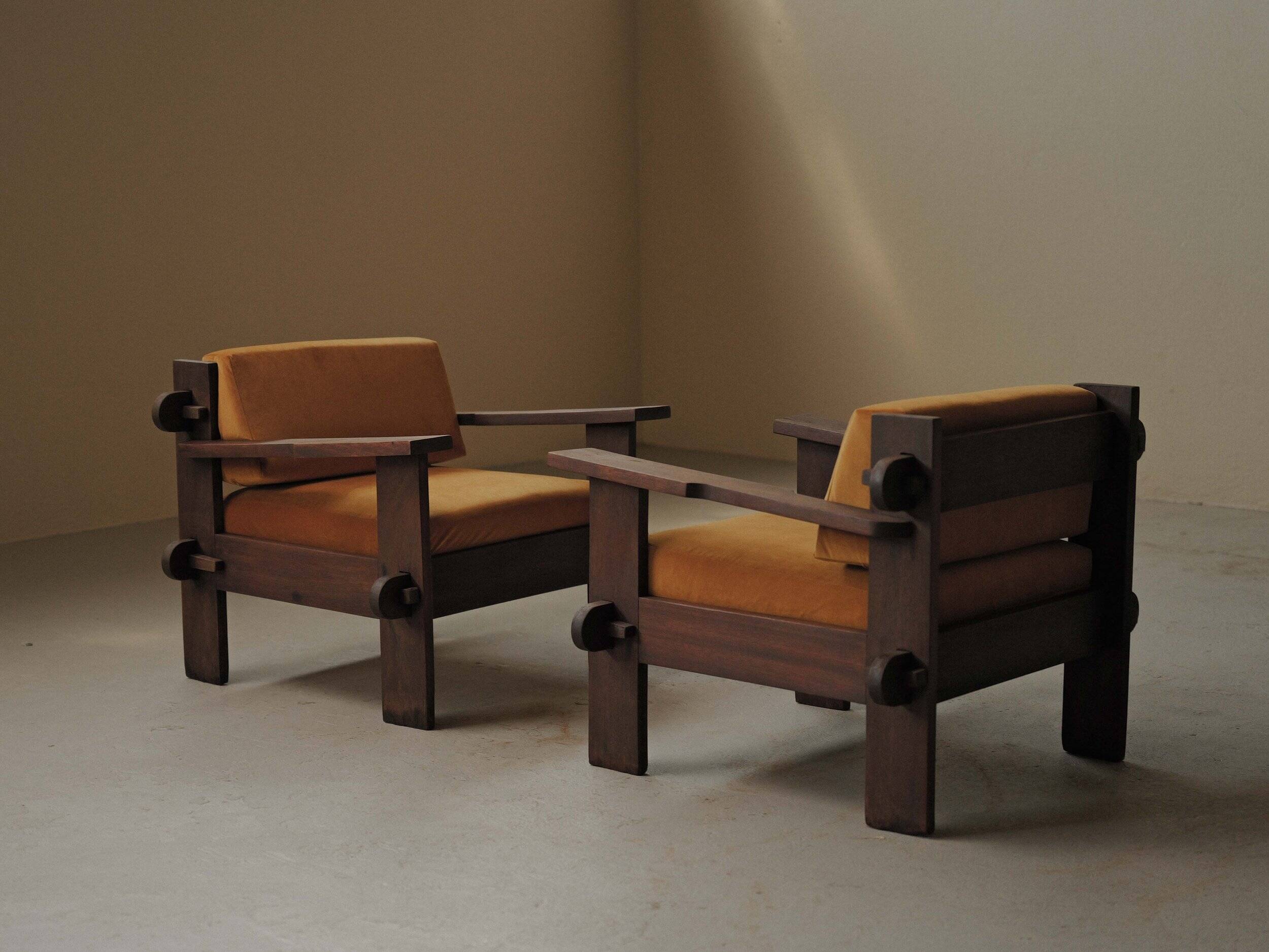 Pair of architect's armchairs in solid wood, France, circa 1970.