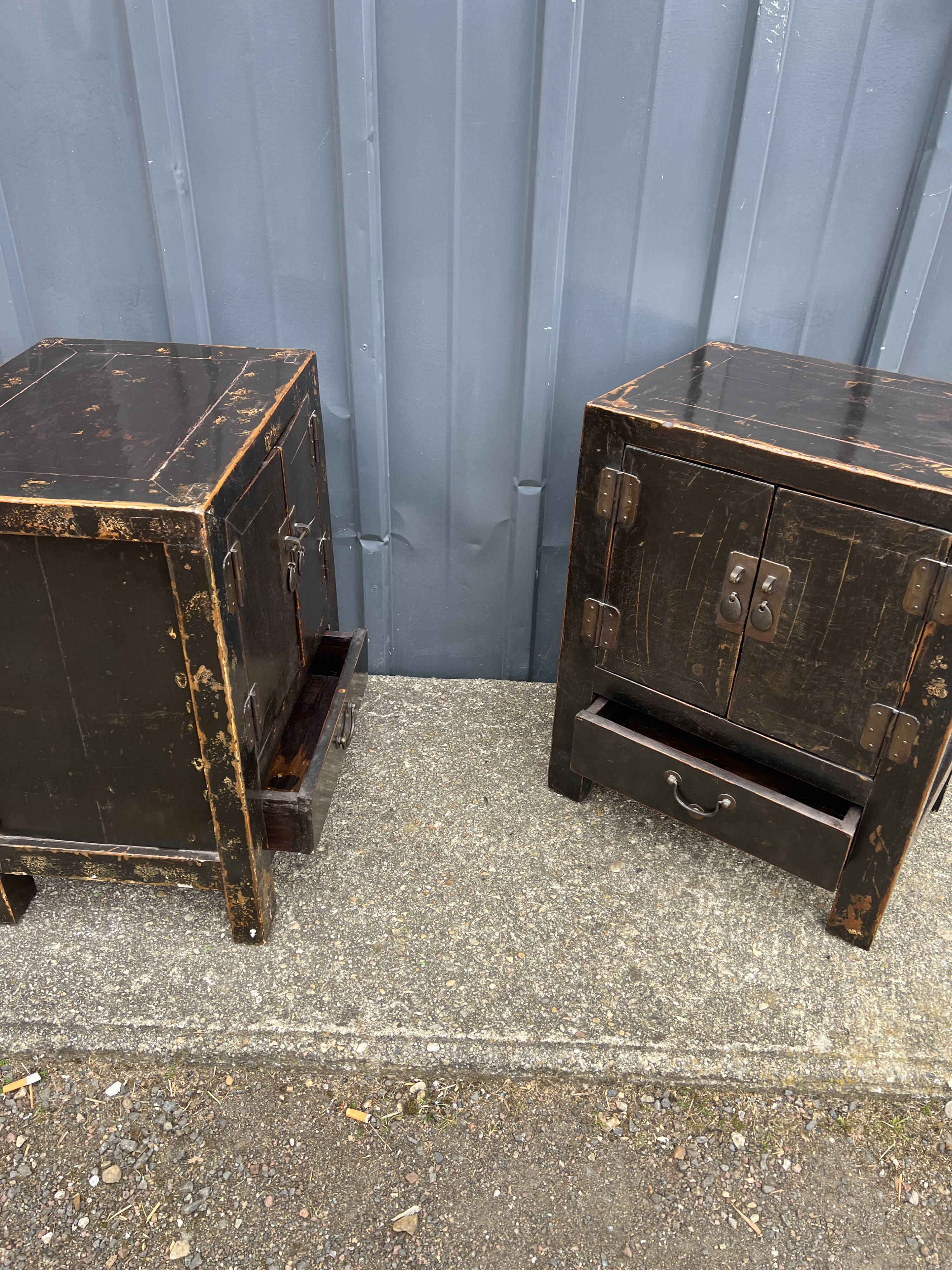 Pair of small occasional or sofa end pieces, lacquered in Asian black
