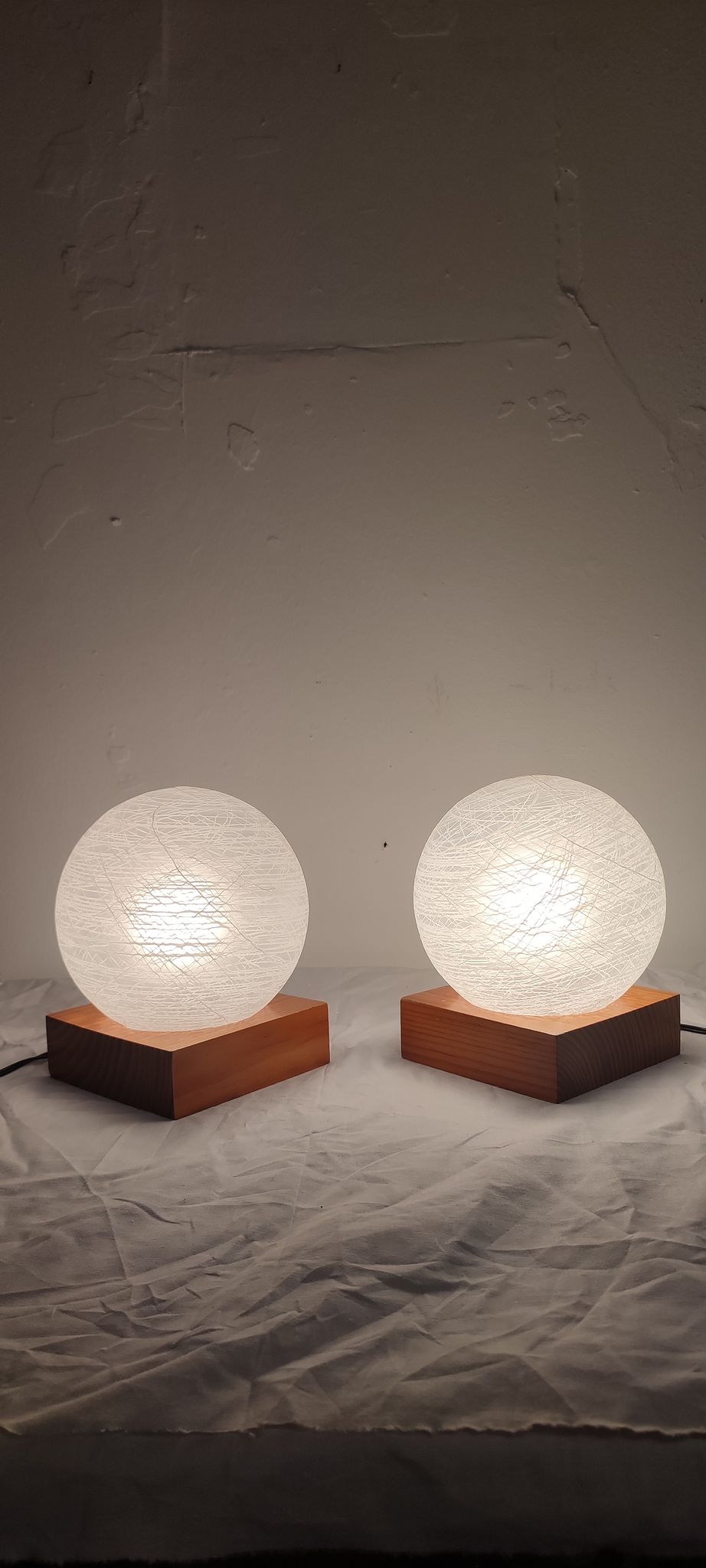 Pair of wooden and glass table lamps. Italy, 1970s.