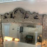 Eventful beveled mirror and openwork period 1900 repelled tin decoration