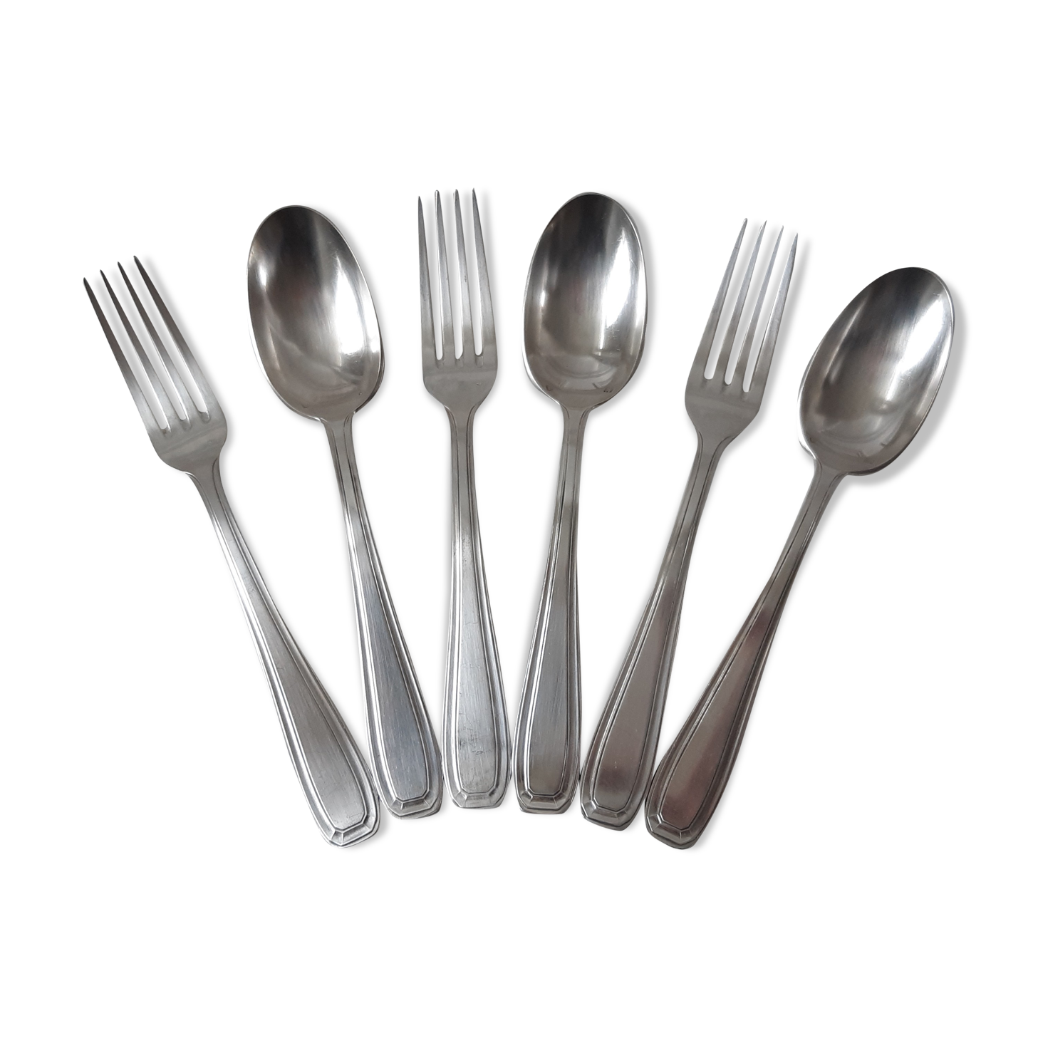 Set of silver metal cutlery 20s