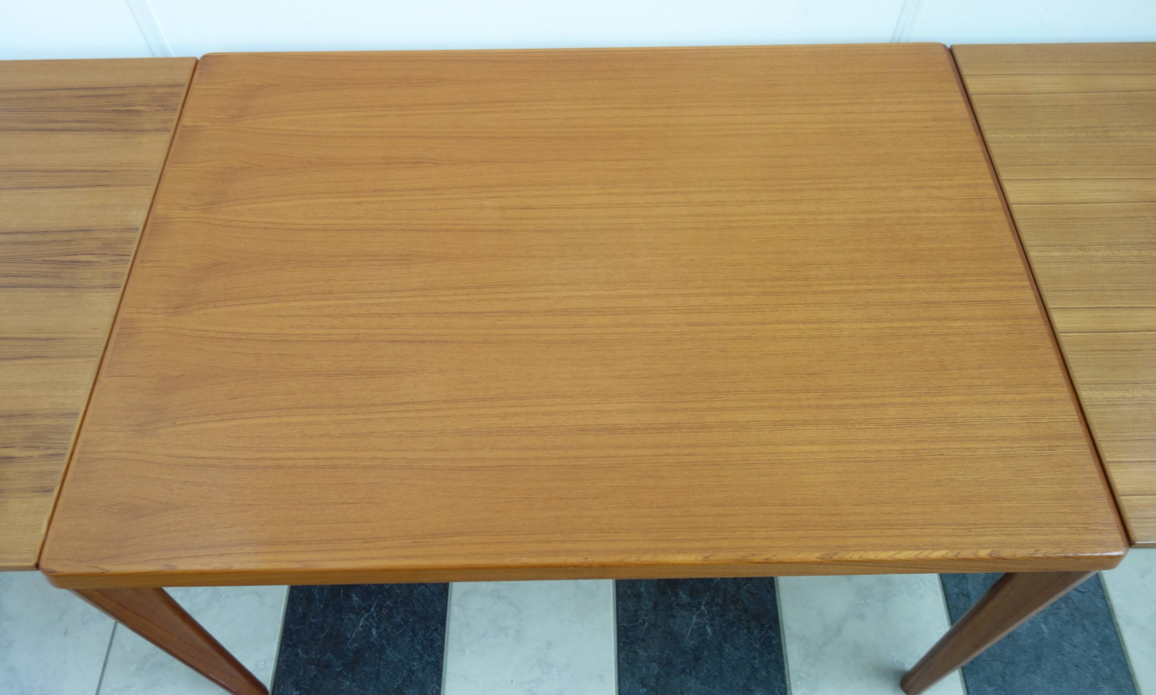 Danish teak dining table by Henning Kjaernulf 1960s