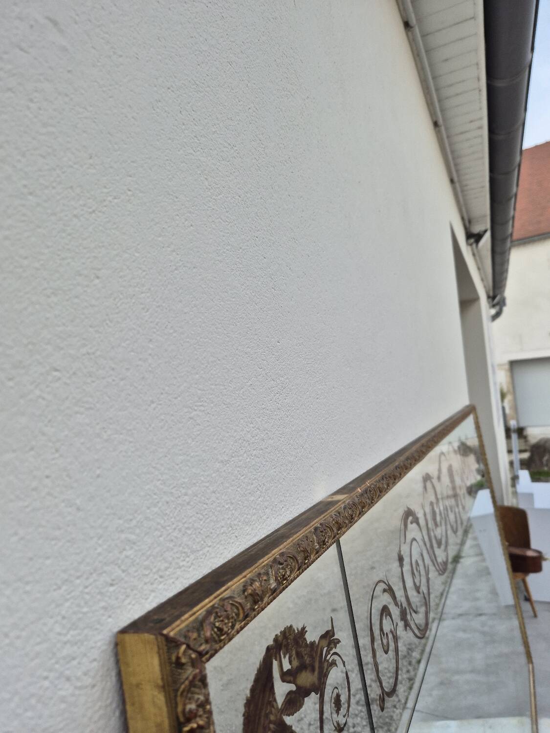 Antique gilded Venetian brasserie mirror in eglomised glass