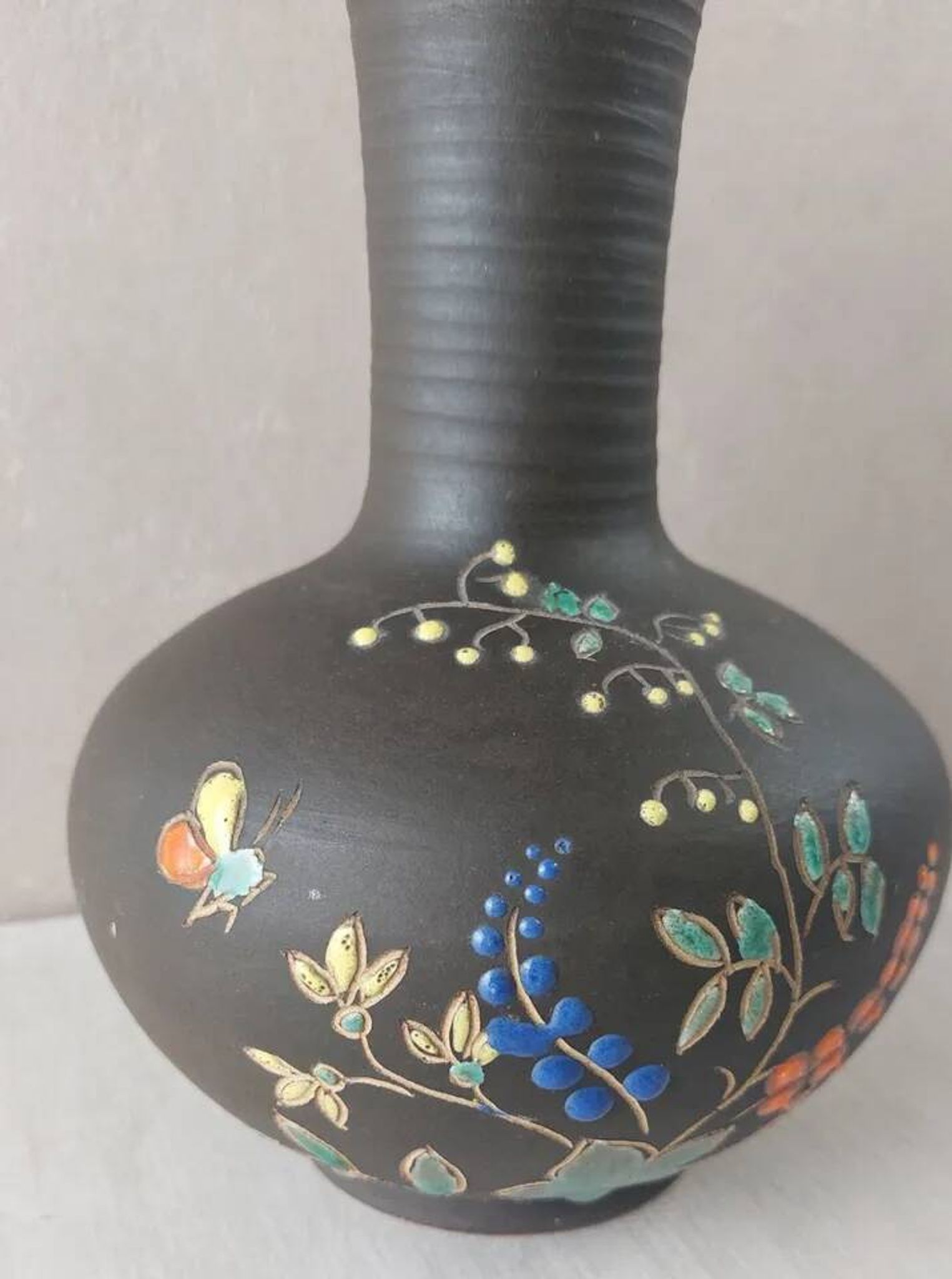 Old vase, enamelled flower decoration, to be identified