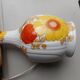 Vintage porcelain foot lamp