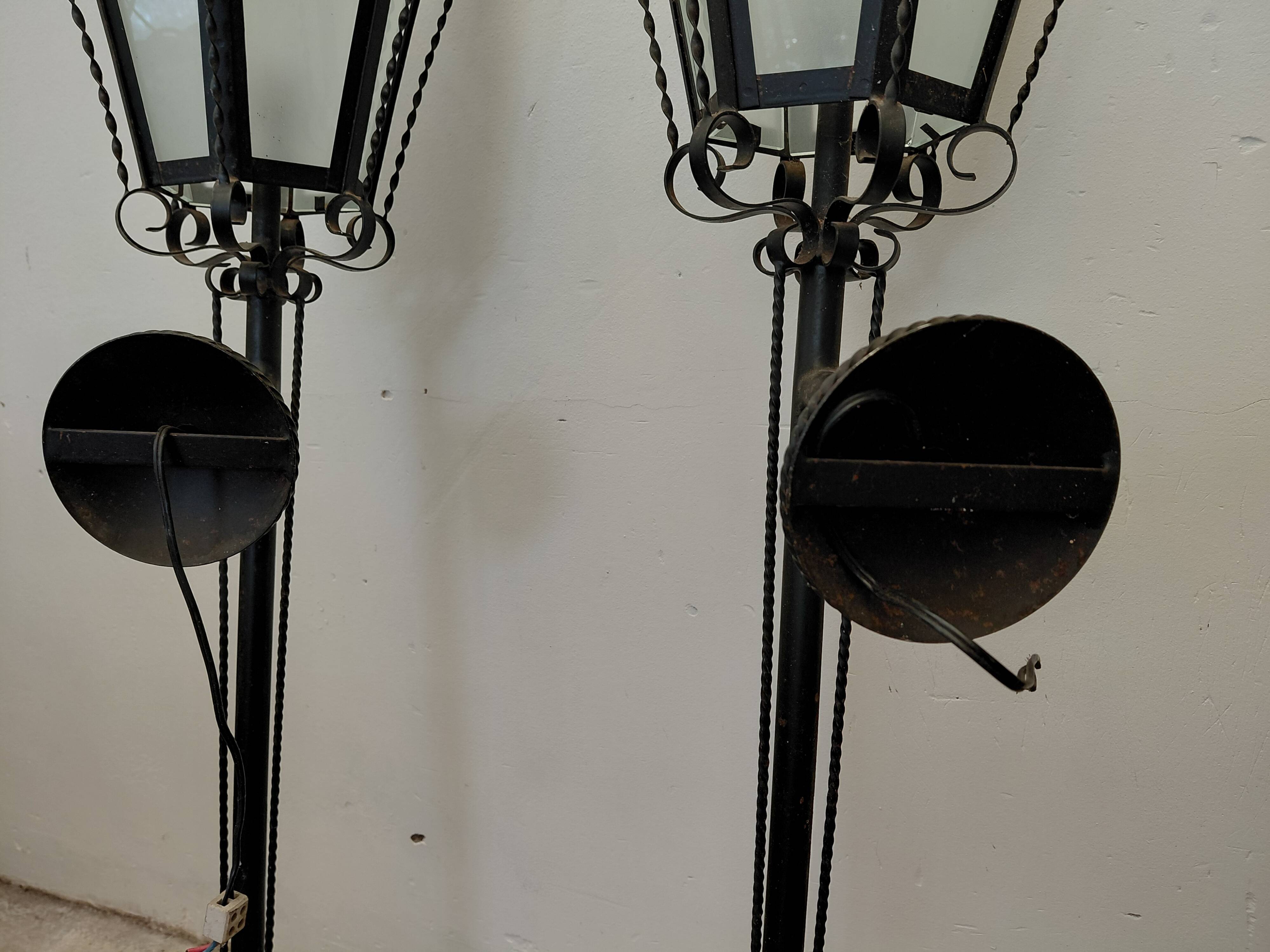 Pair of wrought iron wall sconces, 1950
