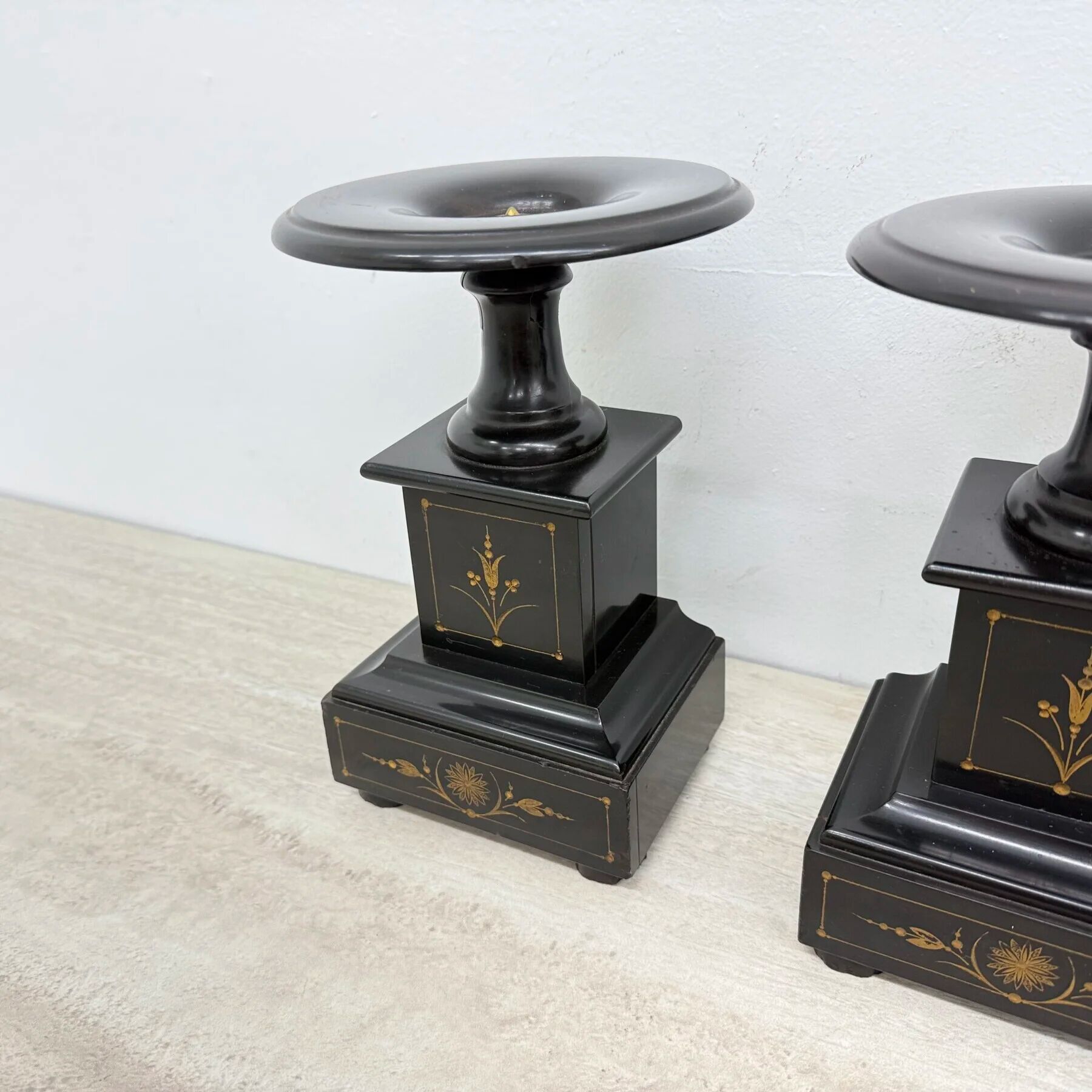 Antique French black marble cassoulets gilt decor pedestals neoclassical pair, 1900s