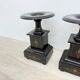 Antique French black marble cassoulets gilt decor pedestals neoclassical pair, 1900s