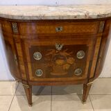 Louis XVI style half-moon chest of drawers in late nineteenth century marquetry