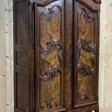 Bressane wardrobe of Louis XV period in walnut and walnut magnifying glass 18th