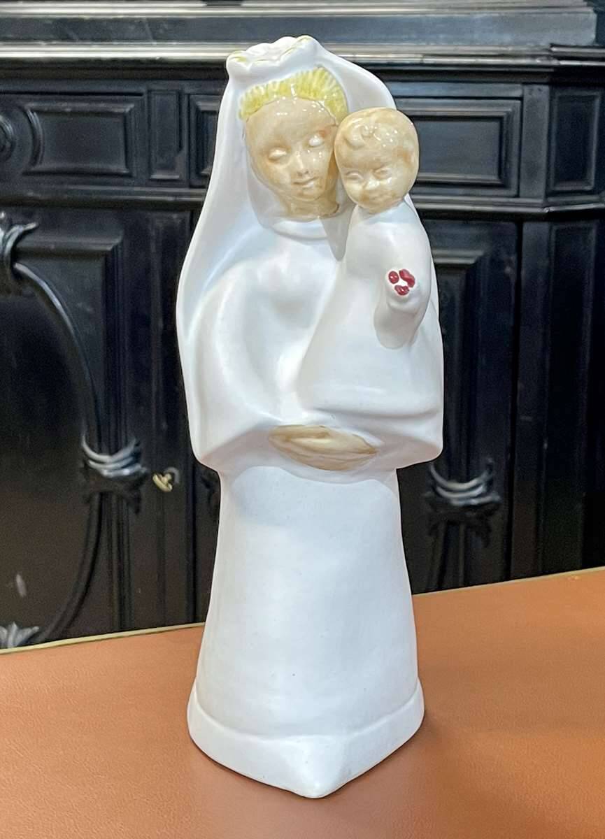 Virgin and child in quimper faience with ivory background by bel delecourt