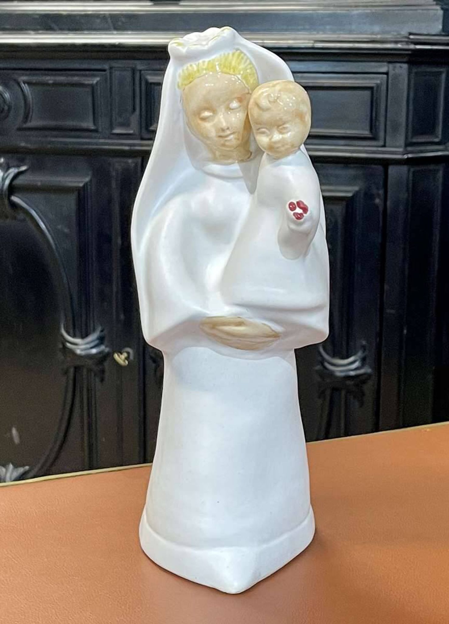 Virgin and child in quimper faience with ivory background by bel delecourt