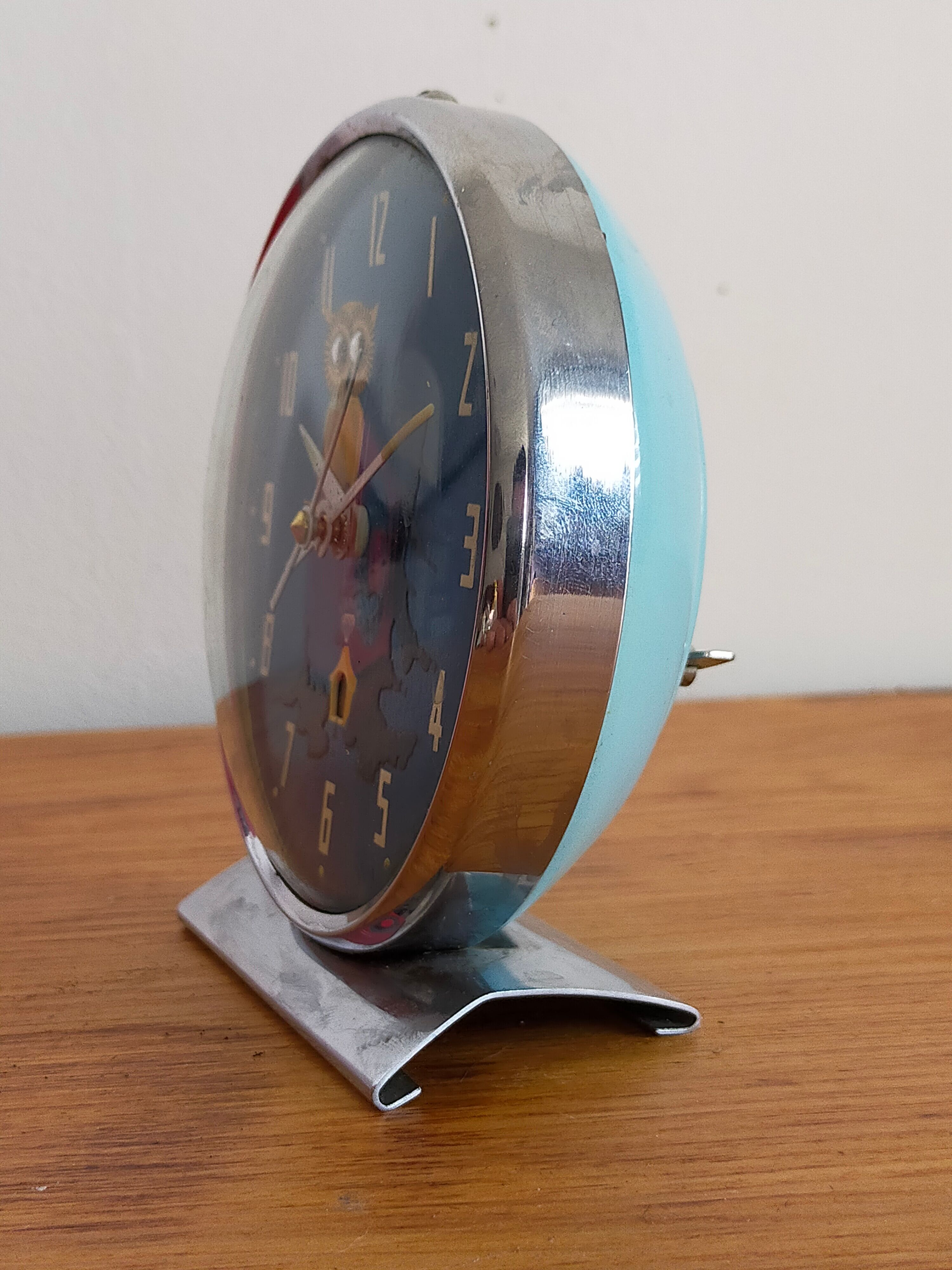 Vintage animated alarm clock in blue owl metal