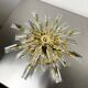 Sun-shaped ceiling or wall light by Oscar Torlasco for StilKronen, cut Murano glass, Italy, 1970s