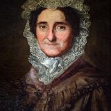 Tableau à l'huile ancien encadré d'or représentant le portrait d'une dame au chapeau