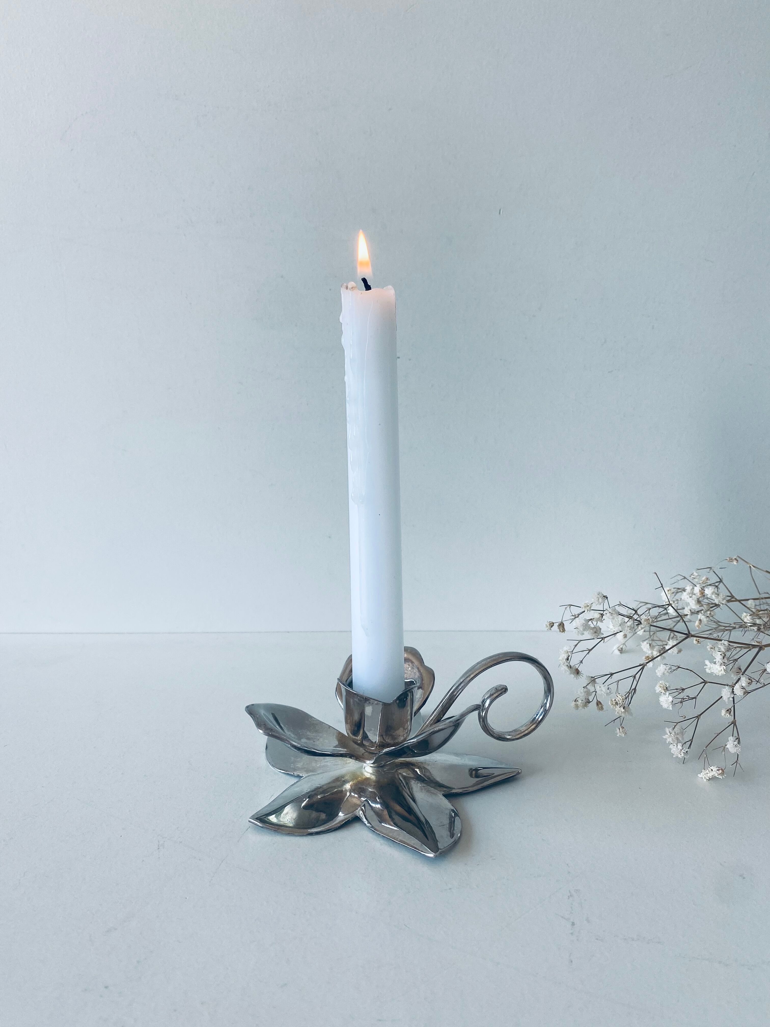 Silver flower candle holder