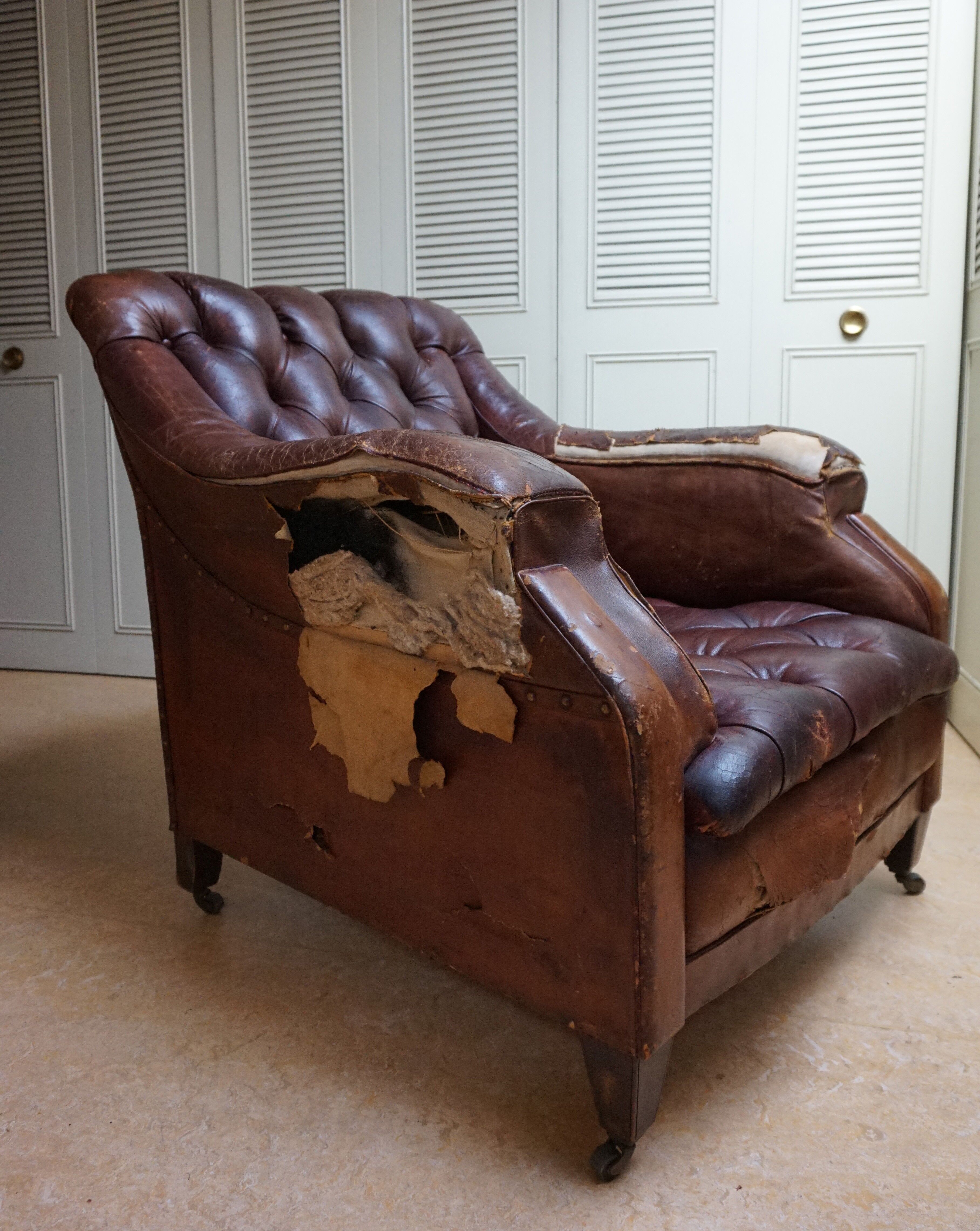 Worn Leather Buttoned Library Fireside Armchair, 1840's
