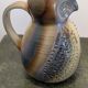 Glazed stoneware pitcher signed JM – Jean-Marie Delahaye – Relief decoration