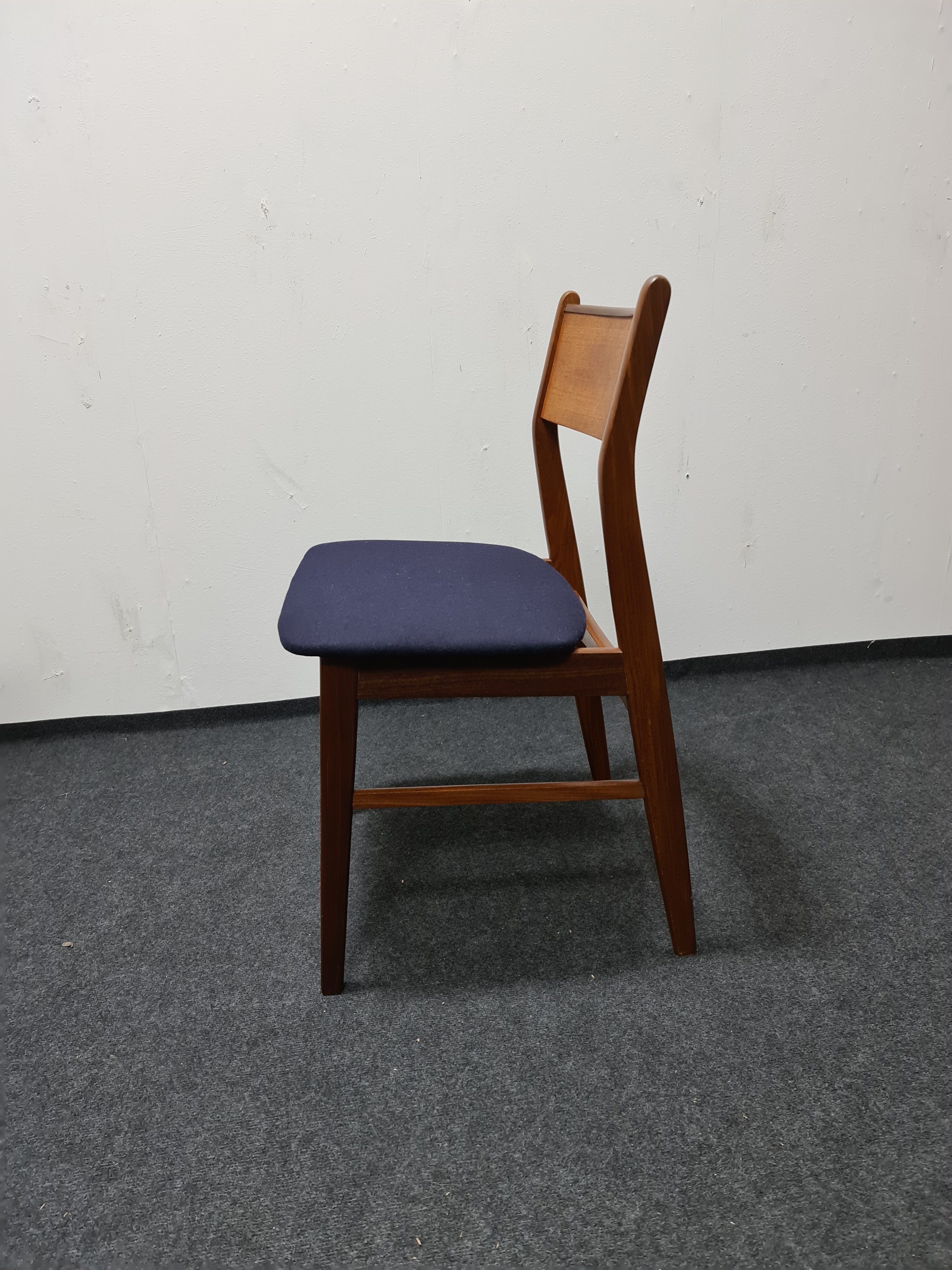 A pair of vintage teak dinning chairs
