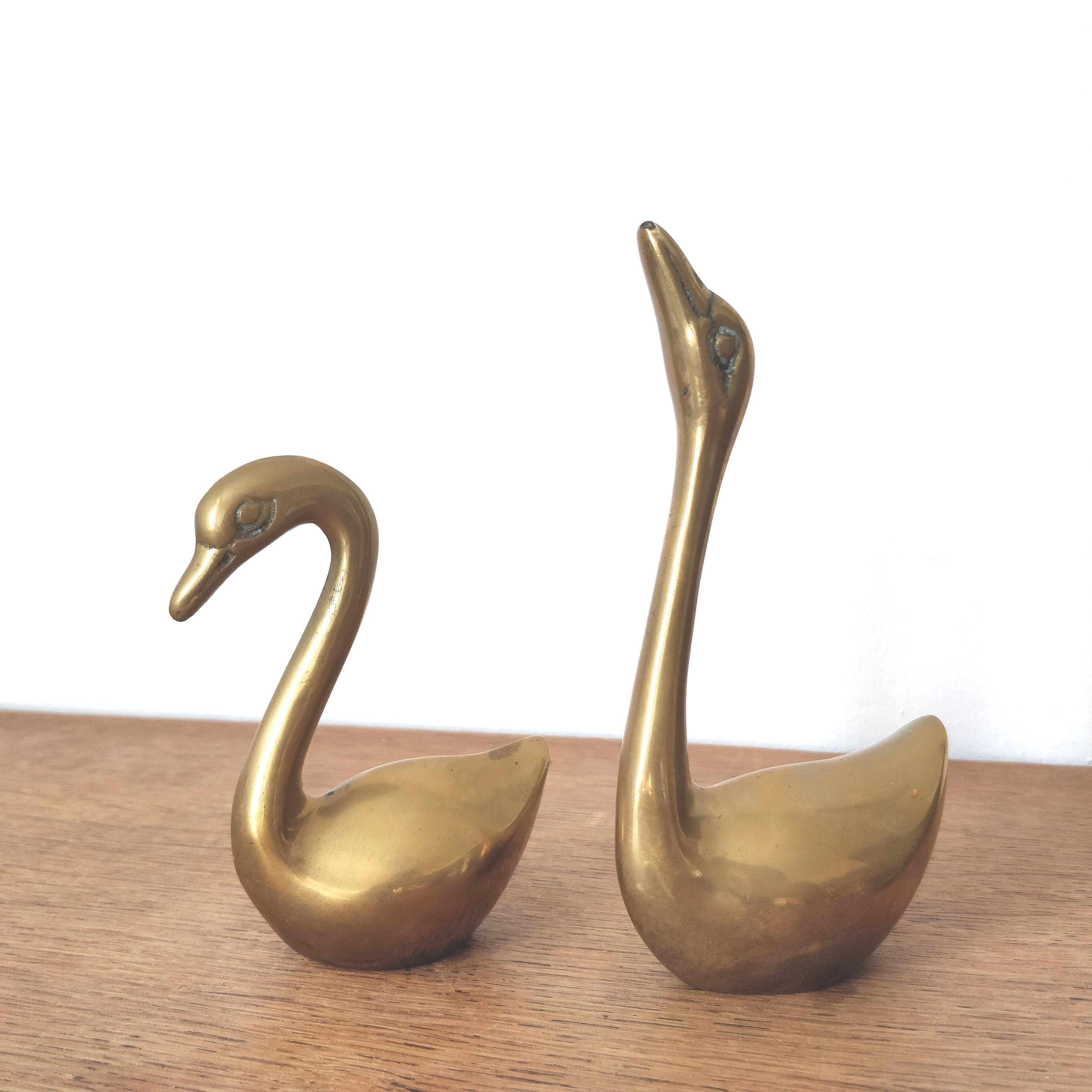 Couple of brass swans