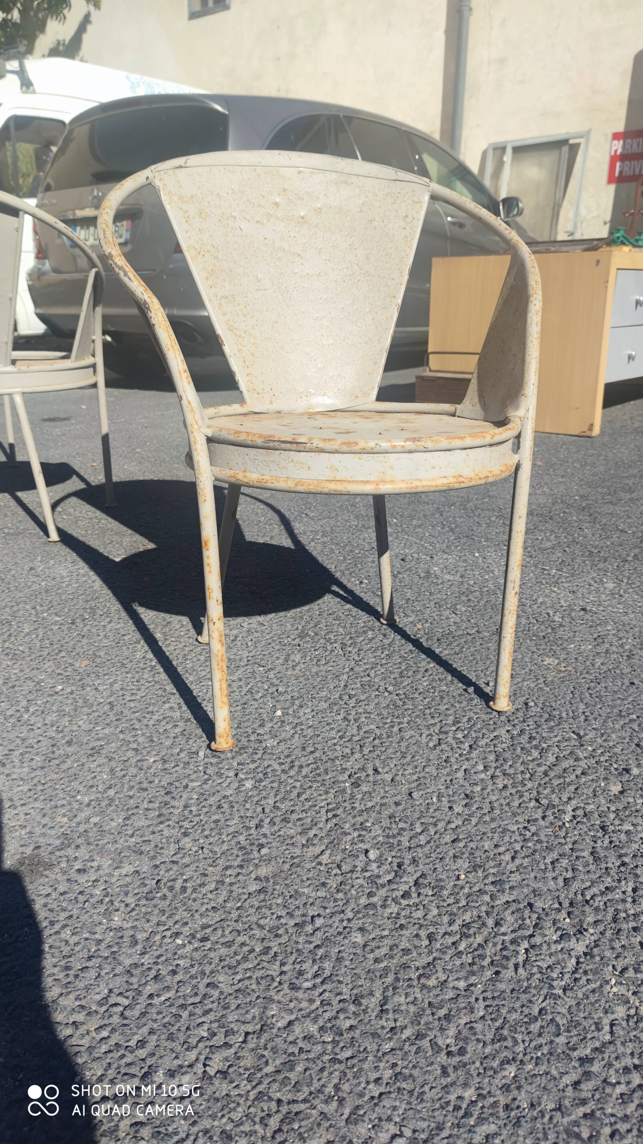 Series of 10 garden chairs made of steel garden patina