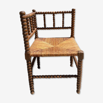 Corner chair in turned wood