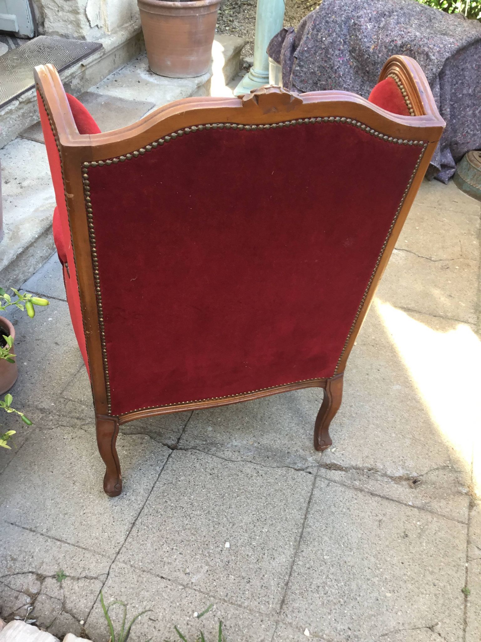 Louis XV style carved wooden winged bergère