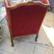 Louis XV style carved wooden winged bergère