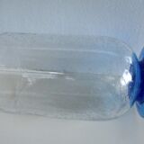 Bubbled glass vase transformable into a photophore