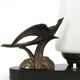 Art Deco lamp with swallow sculpture, marble base, opaque white globe.