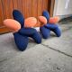 Pair of Lily chairs from the 1990s in blue and coral velvet, postmodern sculptural silhouette.
