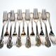 Series of 12 table forks in silver metal ercuis rocaille