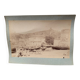 Photo album glued onto cardboard depicting a 19th-century port.
