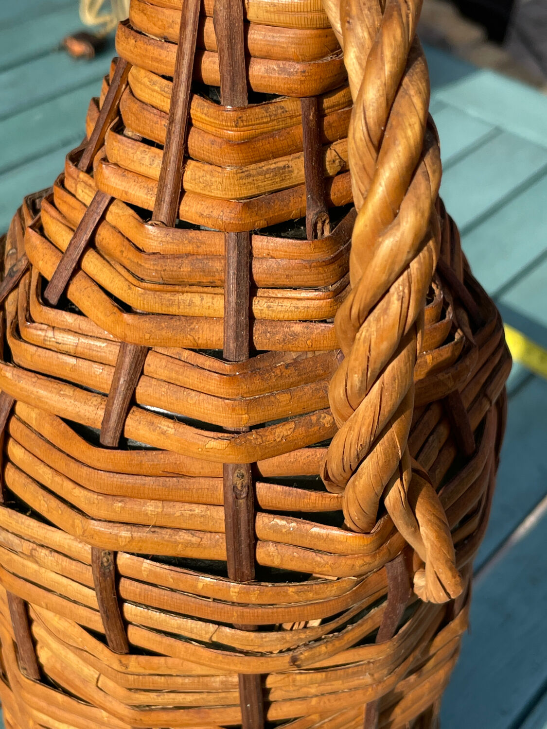 Old wicker bottle