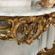 Louis XV style console in carved and gilded wood, circa 1880.