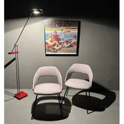 Pair of barrel chairs from the 1950s, in the style of Pierre Guariche.