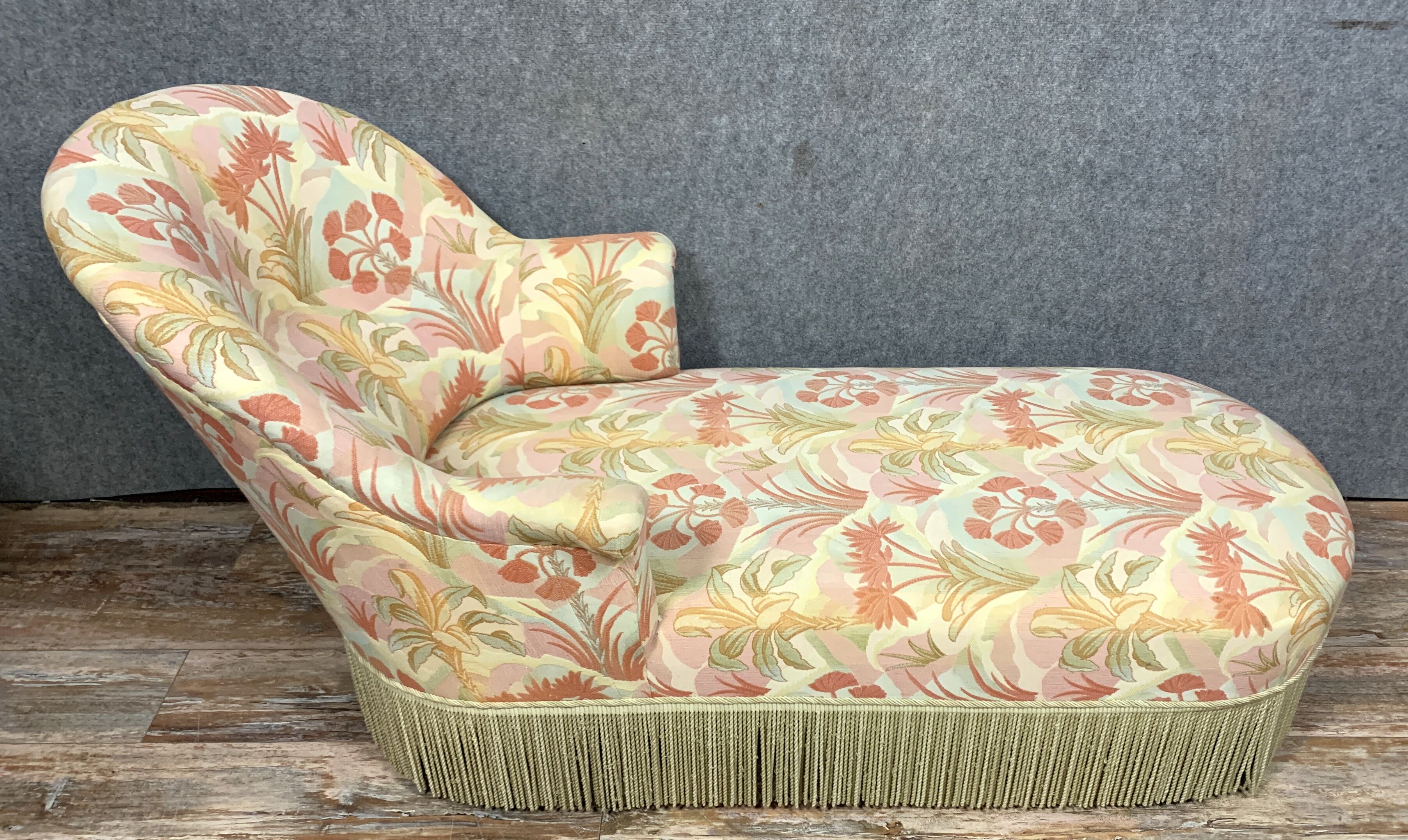 Chaise longue or rest bench Napoleon III era with floral fabric around 1850