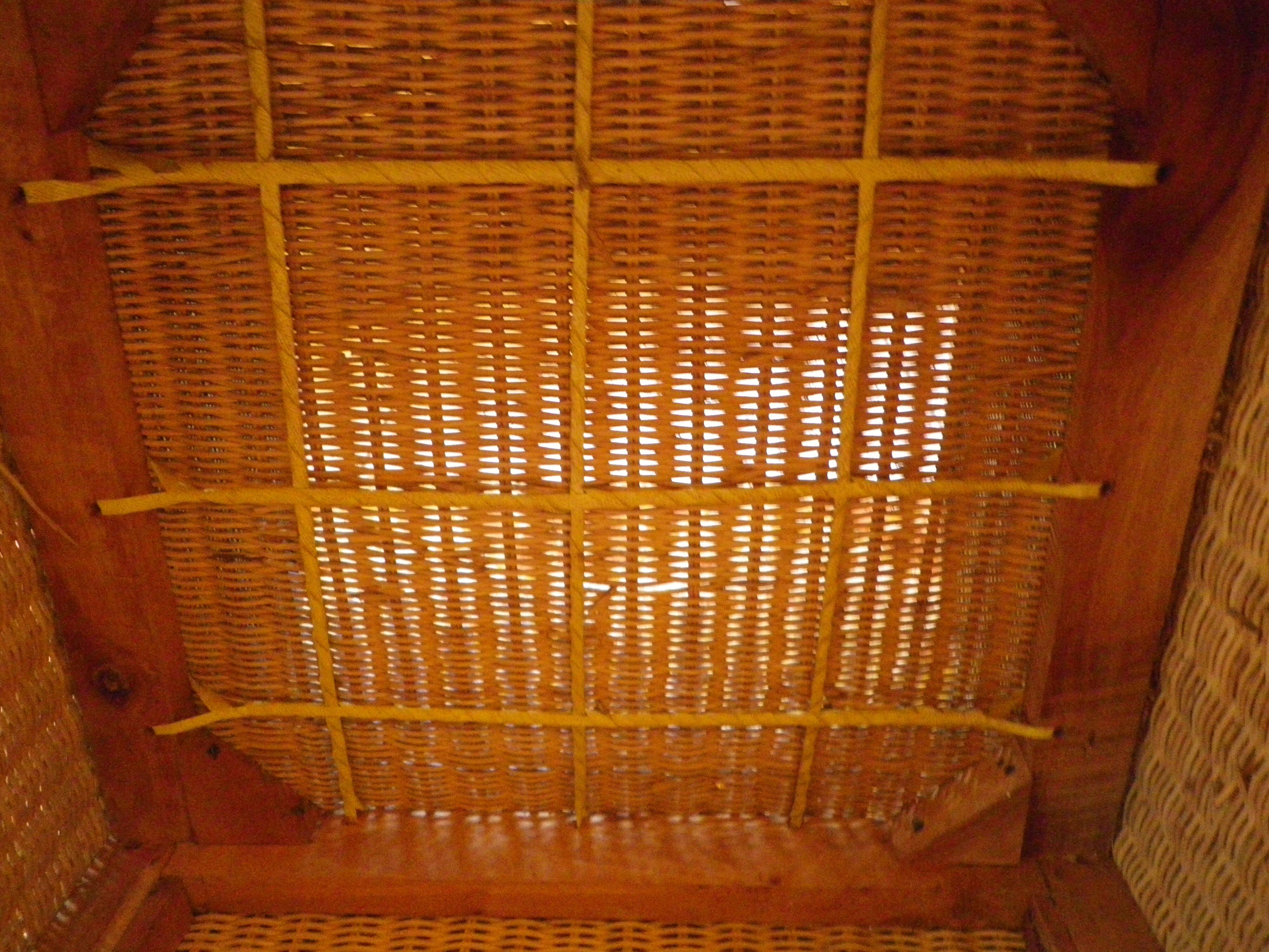 Pair of Club armchairs in ocean liner style, woven rattan and solid wood.