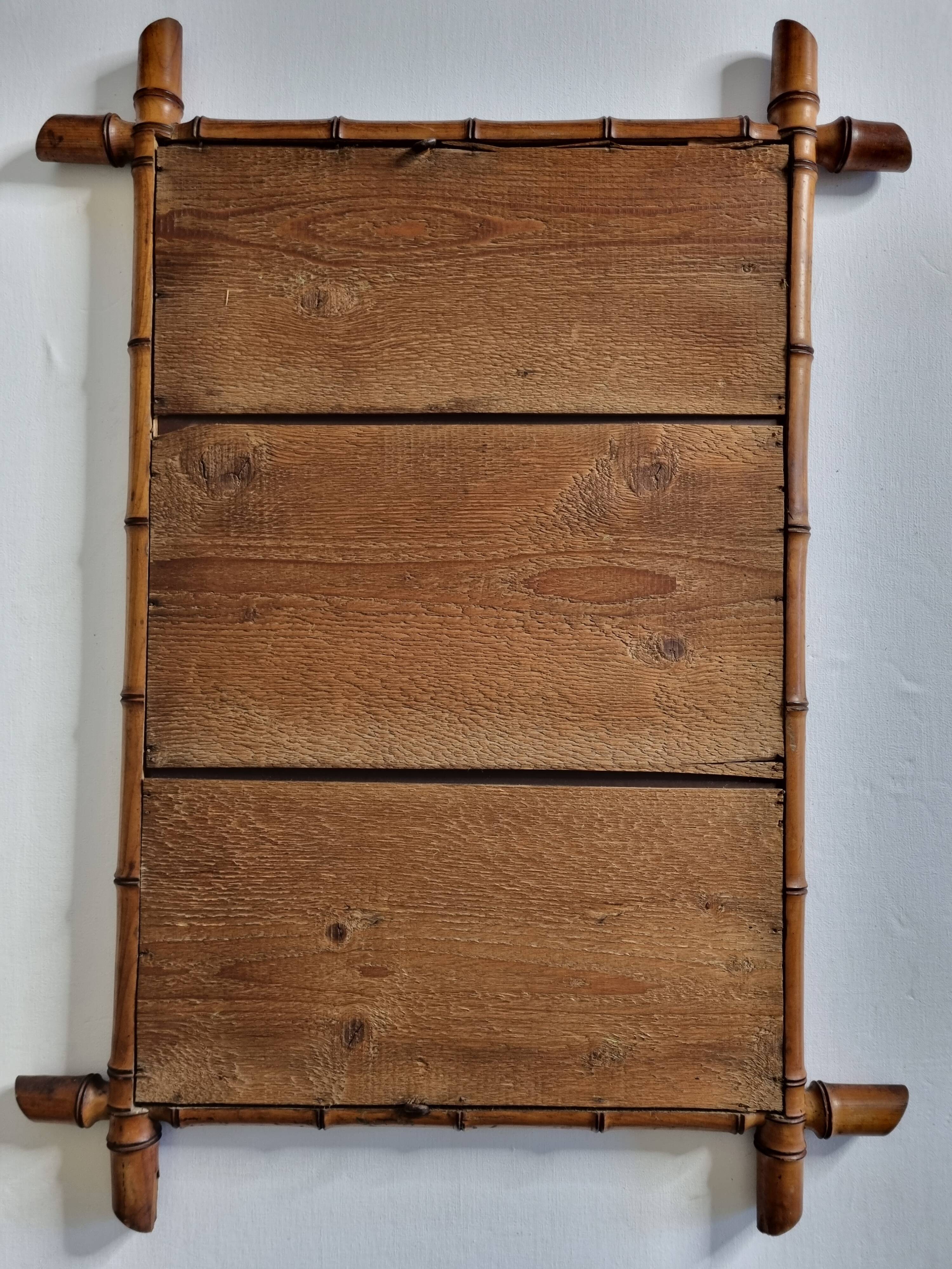 Large turned wooden bamboo mirror, 55 x 78 cm, circa 1900