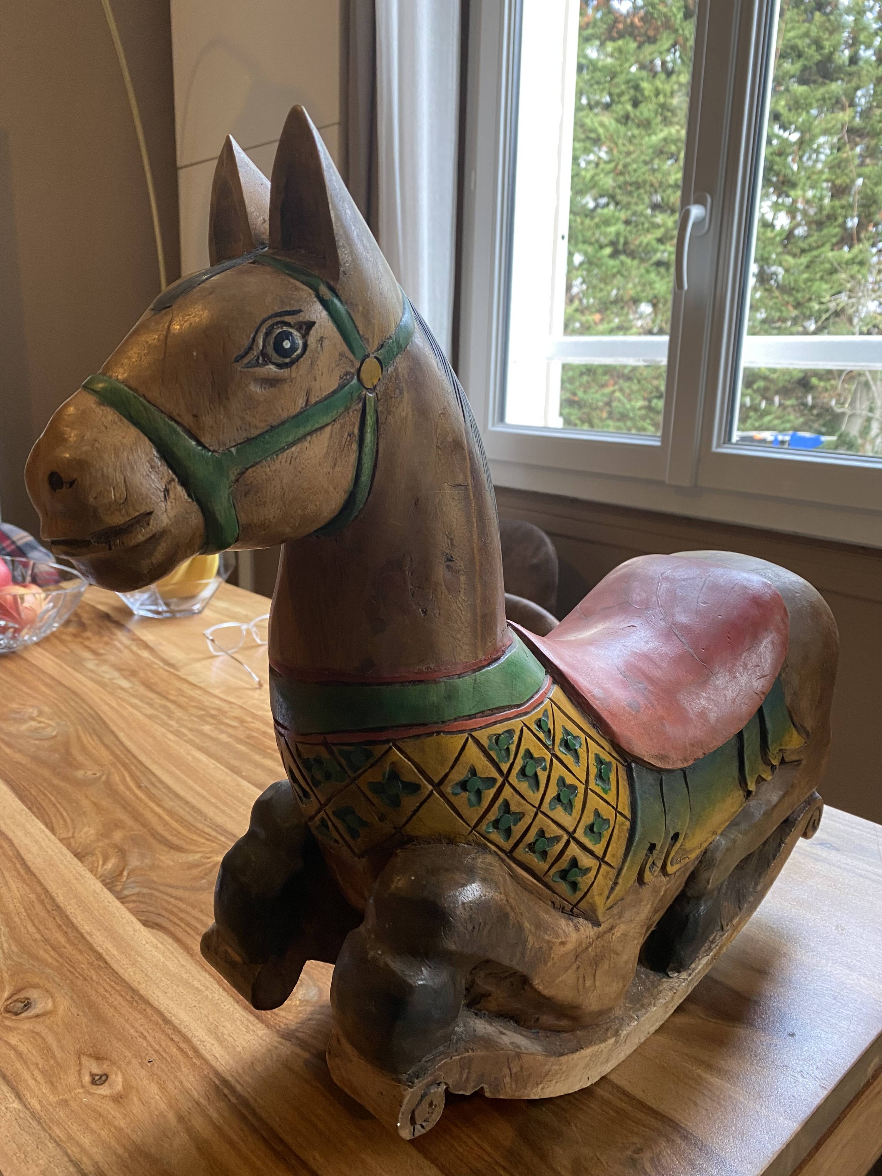 Antique wooden rocking horse, hand-carved.
